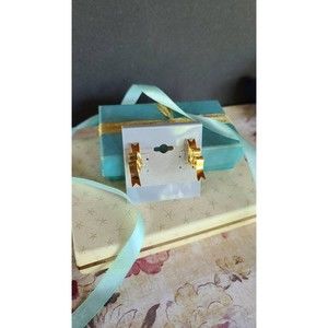 Gold Ribbon Clip-on Earrings